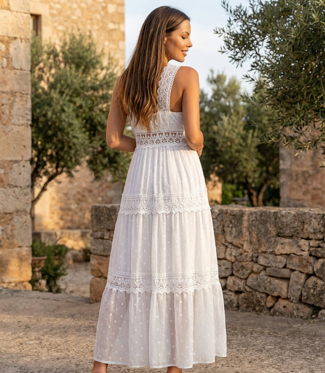 Back view of white floral maxi dress with lace straps and tiered sheer skirt