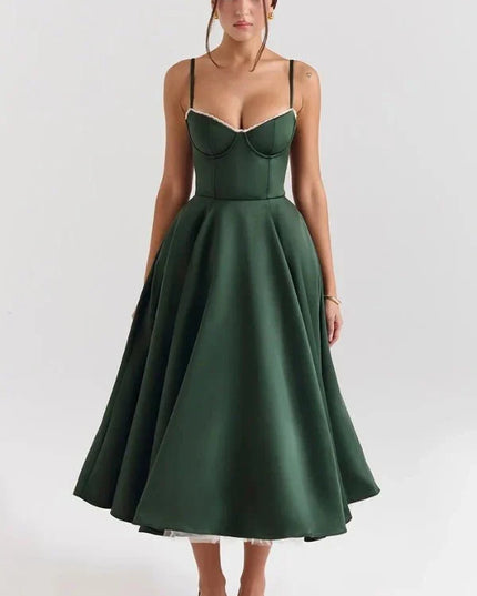 Dark green midi wedding guest dress with sweetheart neckline, straps, and full skirt