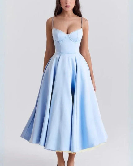 Light blue midi dress with fitted bodice and flared skirt for wedding guest