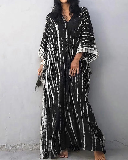 Black tie dye maxi dress with V-neck, flowing sleeves, and long loose silhouette