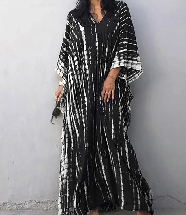 Black tie dye maxi dress with V-neck, flowing sleeves, and long loose silhouette