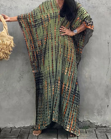 Olive green tie dye maxi dress with orange stripes, wide sleeves, and relaxed fit