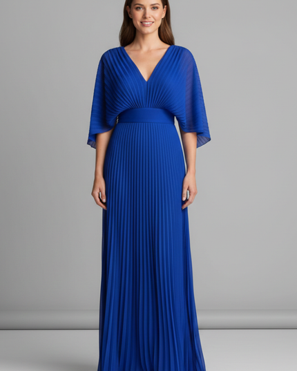 Front view of royal blue V neck pleated maxi dress worn with flowing sleeves