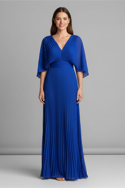 Front view of royal blue V neck pleated maxi dress worn with flowing sleeves