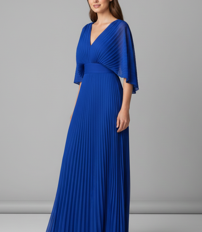 Back view of royal blue pleated maxi dress with open V back and pleated skirt