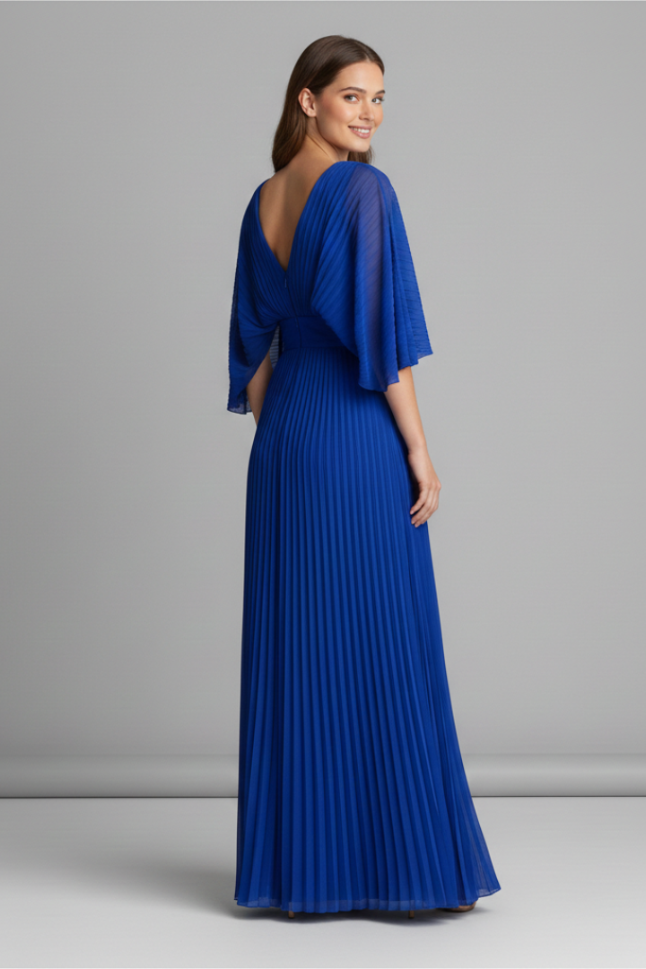 Front view of golden yellow V neck pleated maxi dress with sheer flutter sleeves