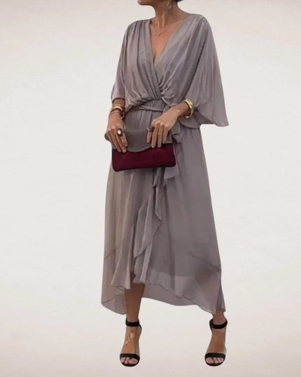 Gray midi wrap dress with V neck, draped short sleeves, and tie waist detail