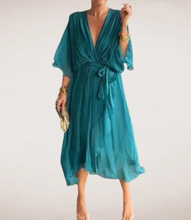 Teal midi wrap dress with deep V neck, tied waist, and soft flutter sleeves
