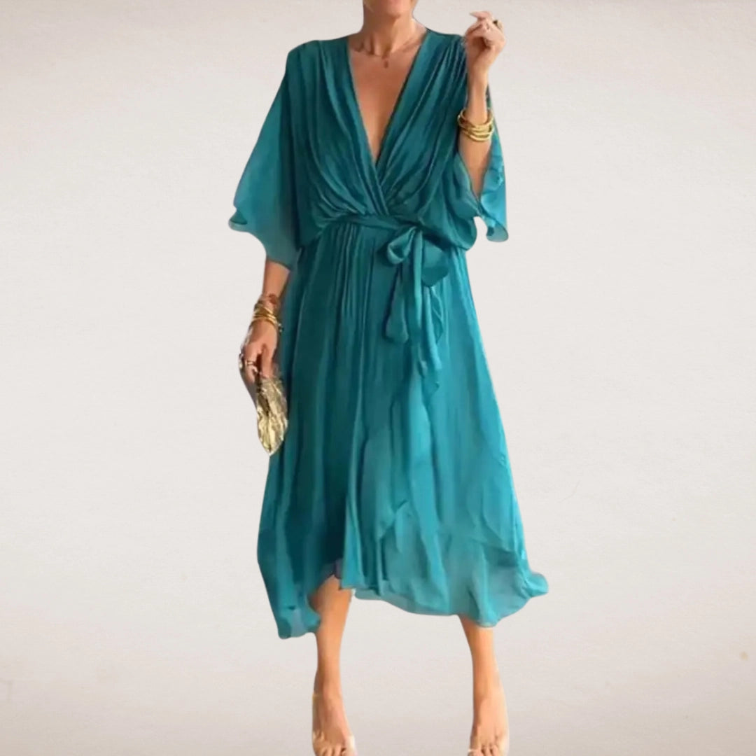 Teal midi wrap dress with deep V neck, tied waist, and soft flutter sleeves
