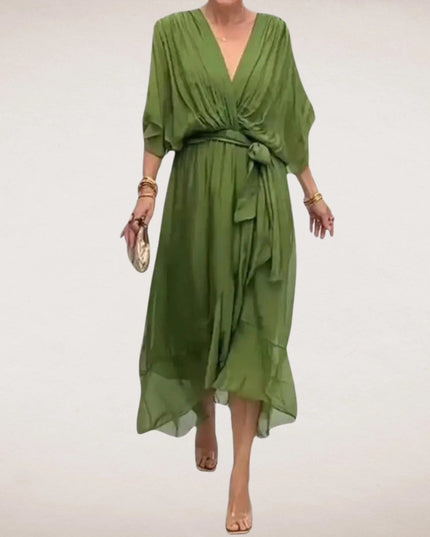 Green v neck midi wrap dress with short sleeves, belted waist, and flowy hem
