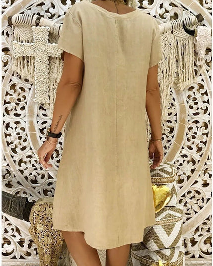 Back view of beige women's summer linen mini dress with short sleeves and straight hem