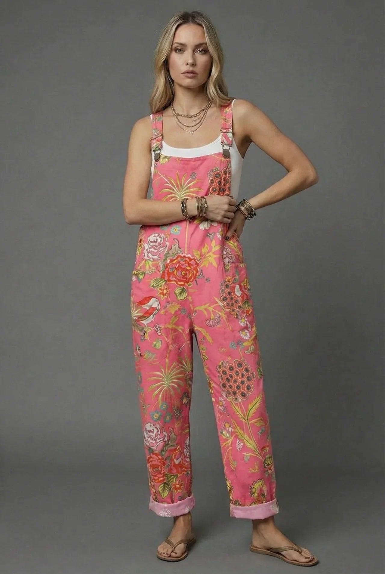 Yellow bee print wide leg romper with daisy pattern, rolled cuffs, and casual summer style