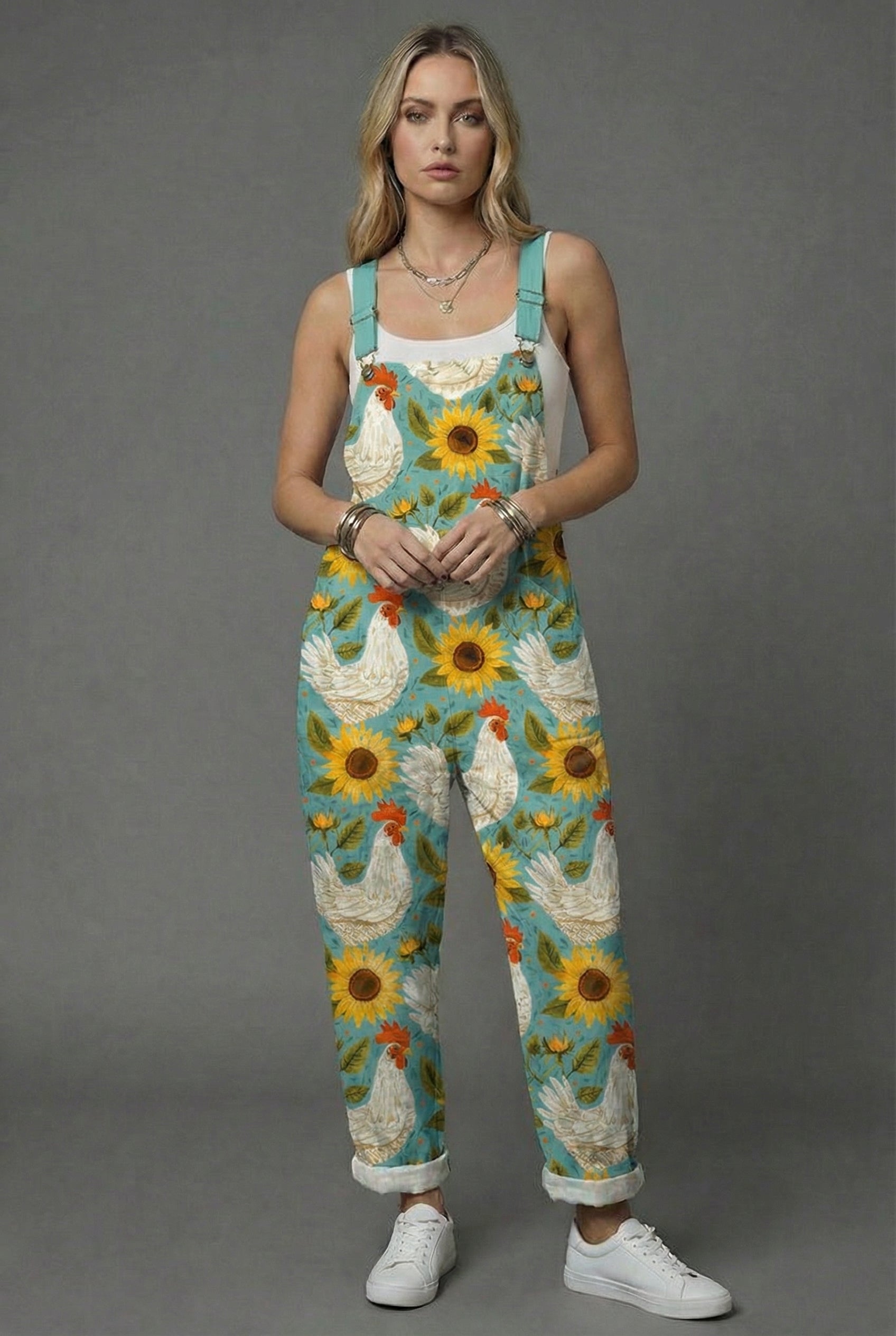 Women botanical print wide leg romper with turquoise chicken and sunflower pattern, sleeveless