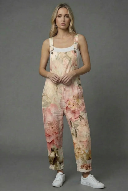 Green textured wide leg romper with raised floral details and a relaxed sleeveless fit