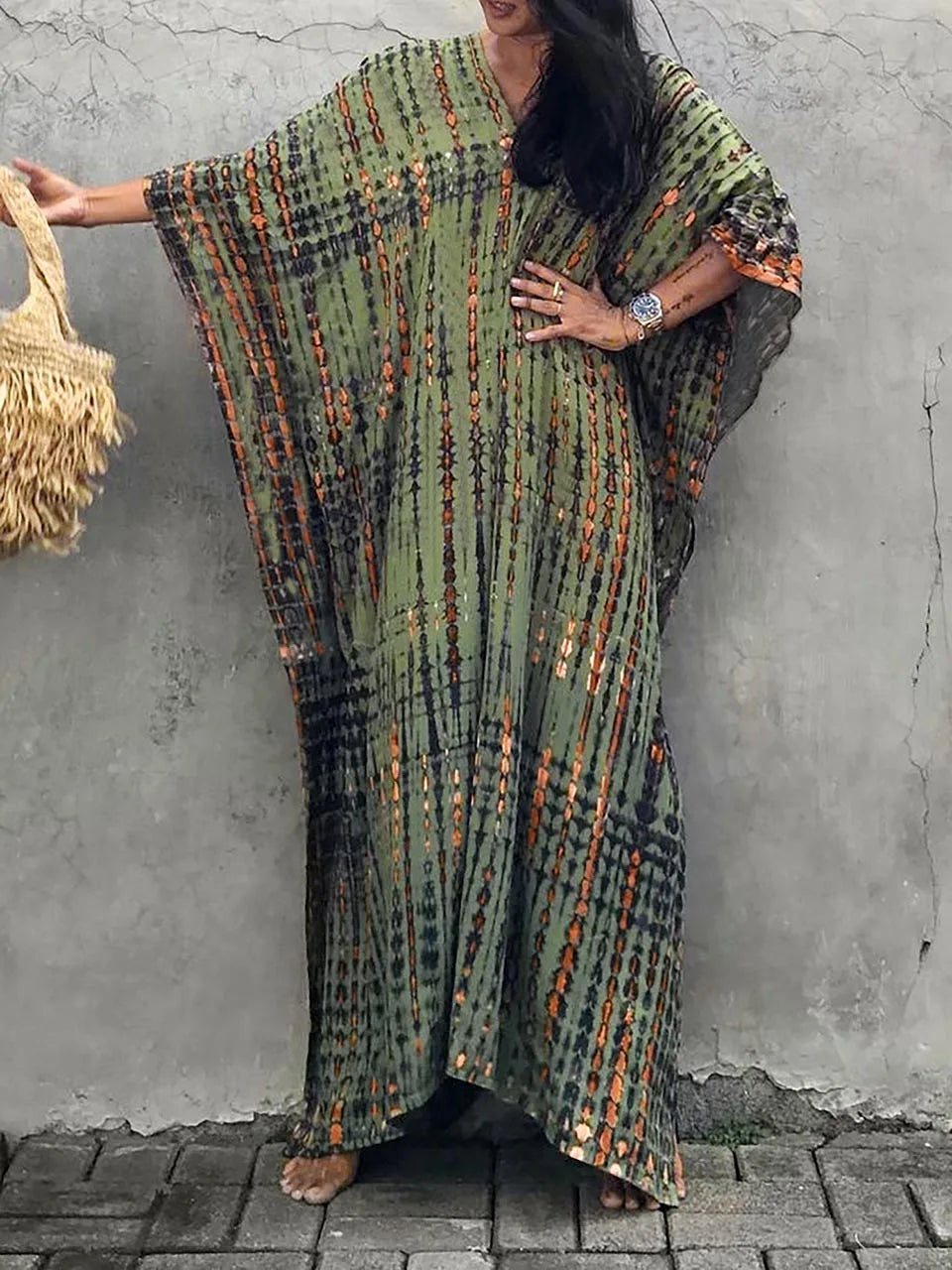 Olive green tie dye maxi dress with orange stripes, wide sleeves, and relaxed fit