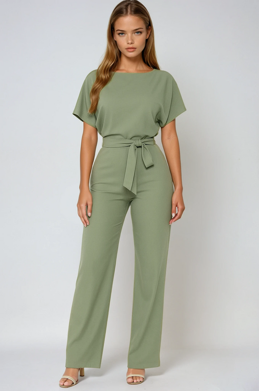 Sage green wide leg jumpsuit with short sleeves, boat neckline, and tied waist belt