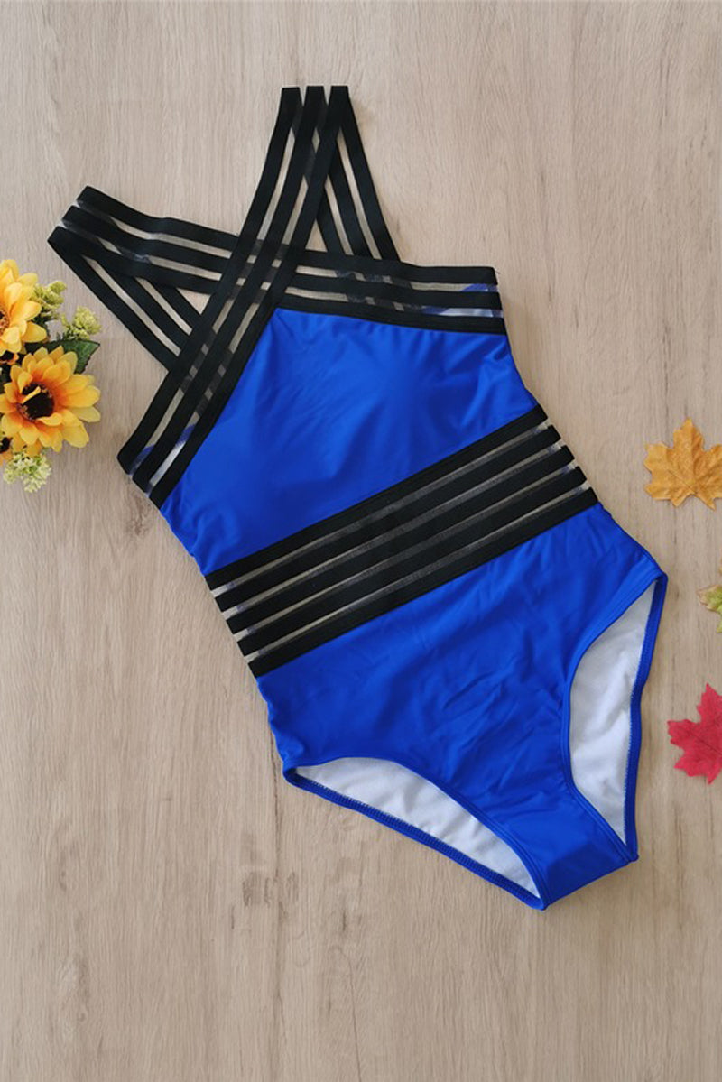 Blue and black criss cross one piece swimsuit laid flat with sheer stripe accents