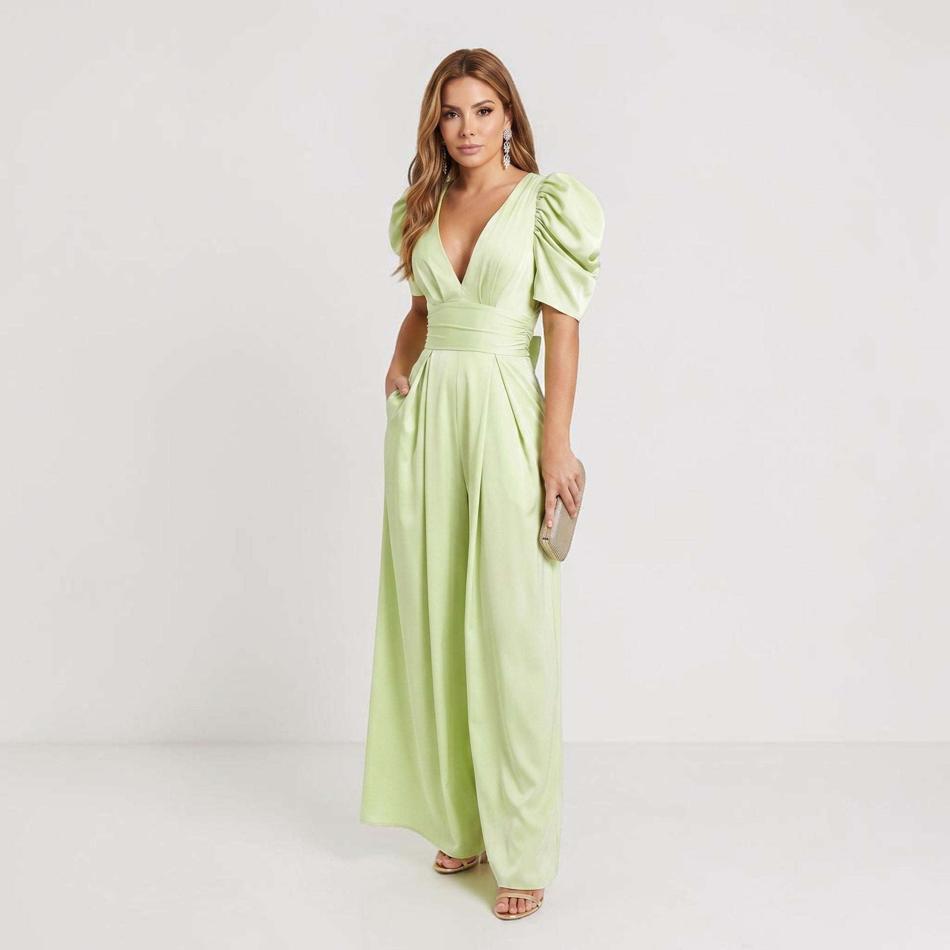 Light green wide leg jumpsuit with puff sleeves, deep V-neck, and soft drape
