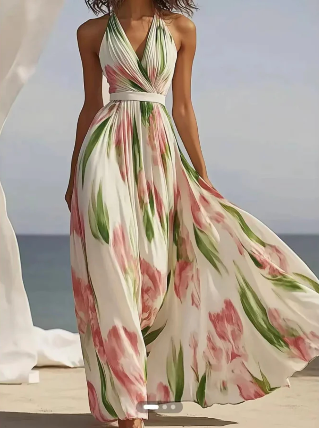 Cream floral halter maxi dress with pink and green print, fitted waist and full flowing skirt