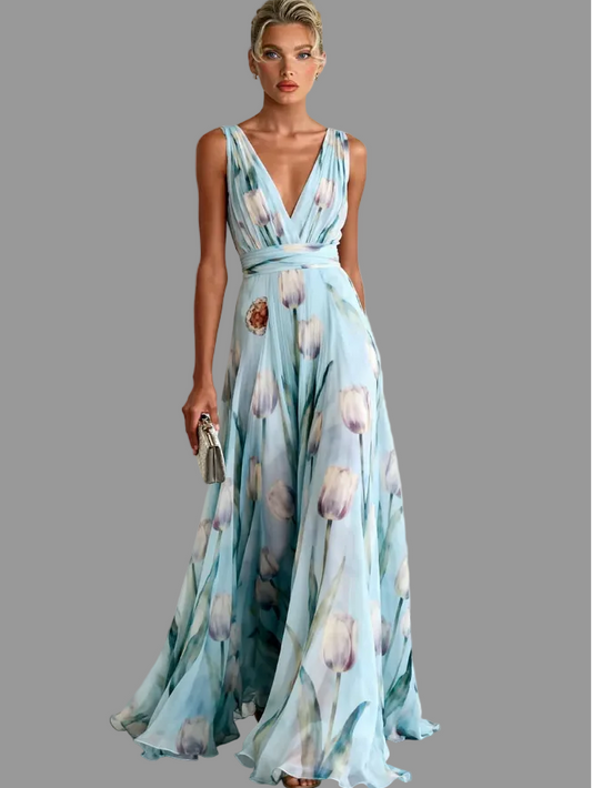 Light blue floral sleeveless maxi dress with deep V-neck and waist tie, flowing skirt