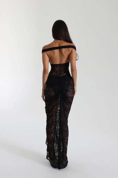 Back view of black off shoulder lace maxi dress with open back and floor length hem
