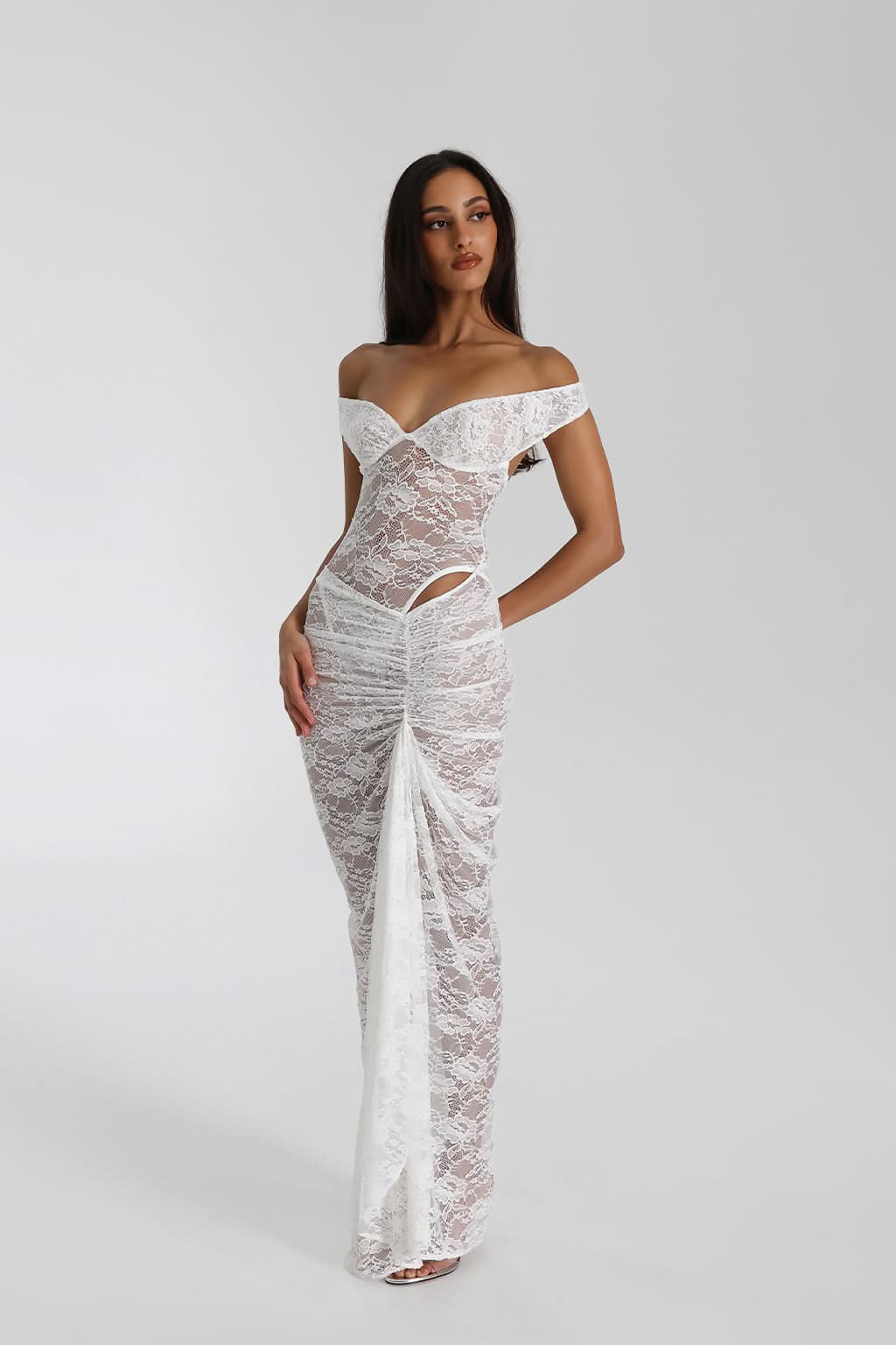 Rear view of black lace maxi dress showing off shoulder neckline and sheer back detail