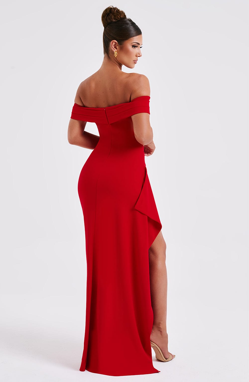 Front view of red off shoulder maxi dress with sleek formal fit and floor length hem