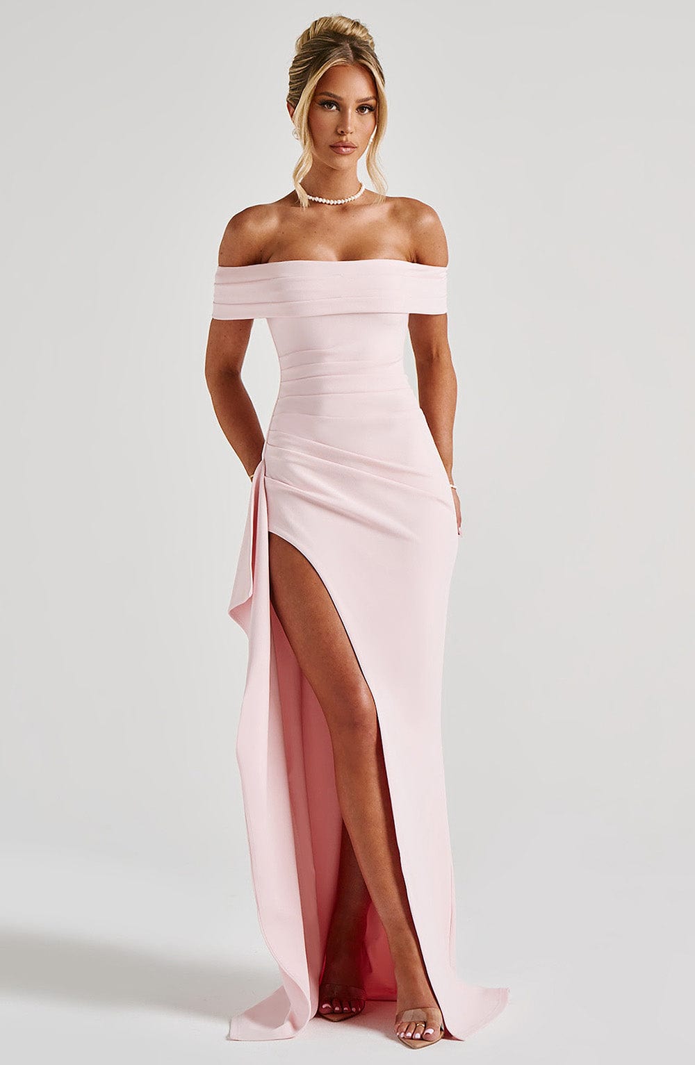 Women's formal off shoulder maxi dress in light pink with high slit and draped skirt