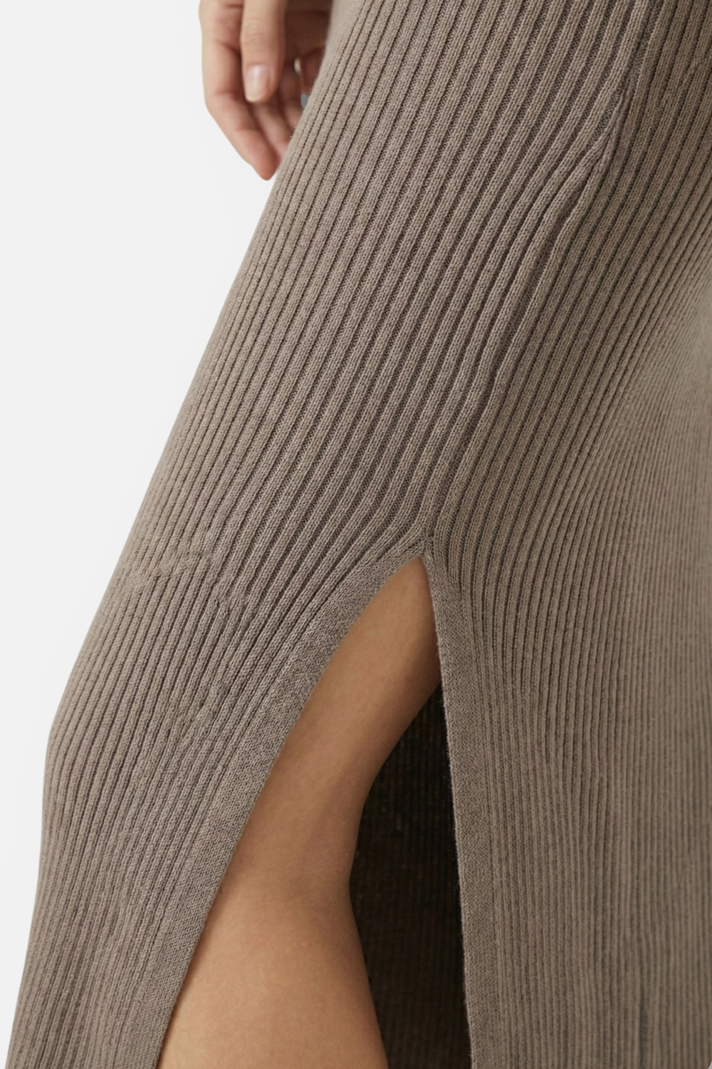 Close-up of taupe ribbed maxi dress showing side slit detail
