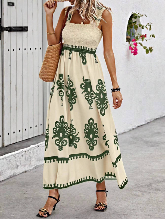 Cream bohemian floral maxi dress with green print, smocked bodice and square neckline