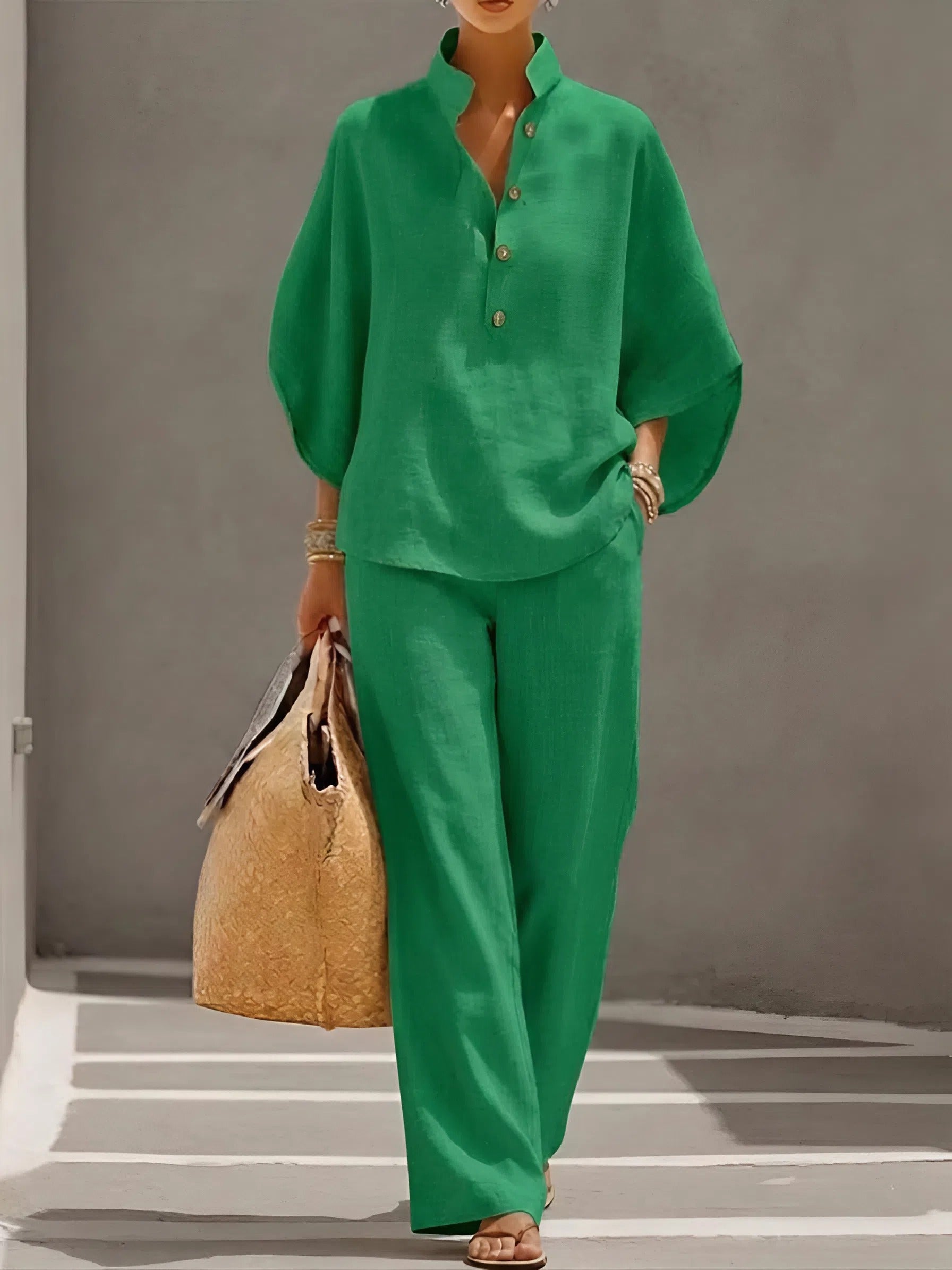 Green summer two piece set with loose button up shirt top and wide leg pants