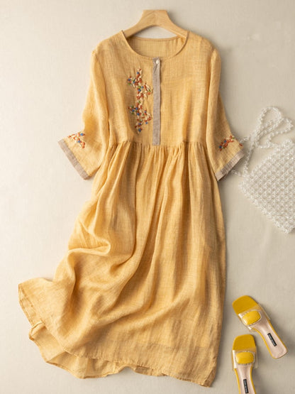 Mustard yellow women's summer embroidered midi dress with 3/4 sleeves and floral detail