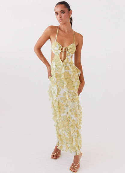 Women's summer floral maxi dress with ruched bust, front cutout, and ruffle trim