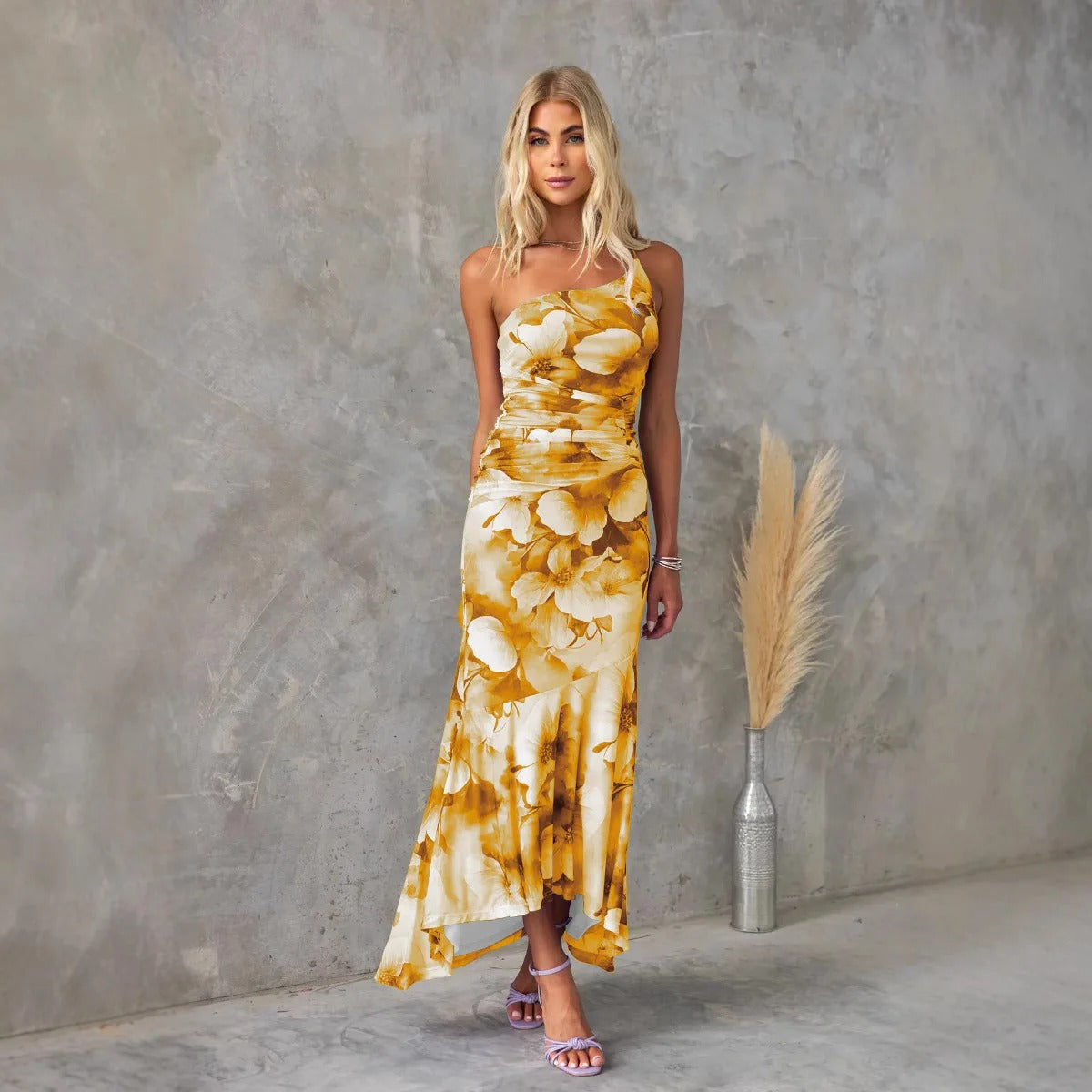 Green floral one shoulder midi dress with fitted silhouette and flowing midi length