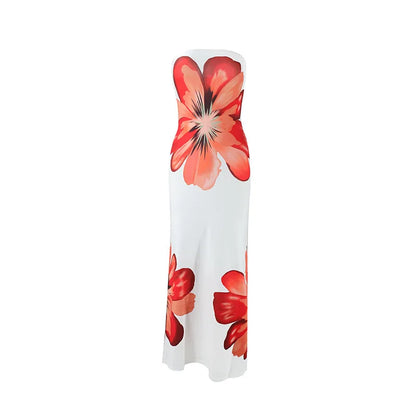 Back view of blue floral strapless maxi dress with cream skirt and large flower detail