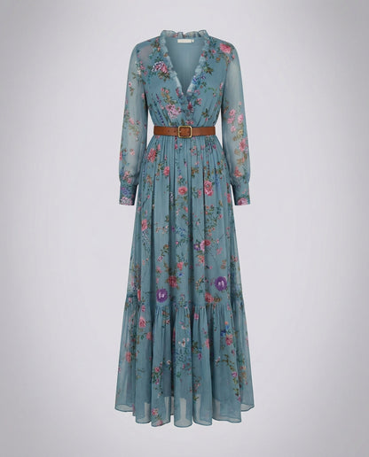 Blue floral V-neck maxi dress with ruffle neckline, long sleeves, and brown buckle belt