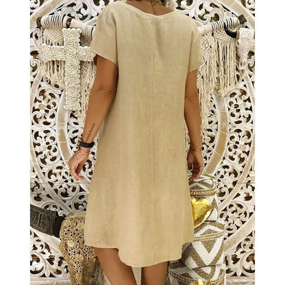 Back view of beige women's summer linen mini dress with short sleeves and straight hem