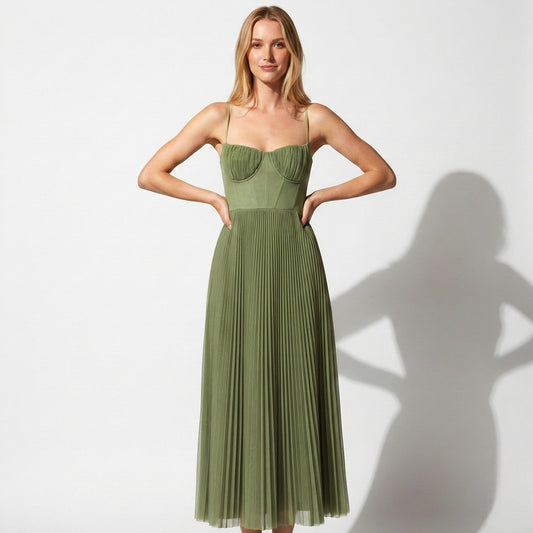 Olive green midi dress with spaghetti straps, ruched bust, and pleated skirt