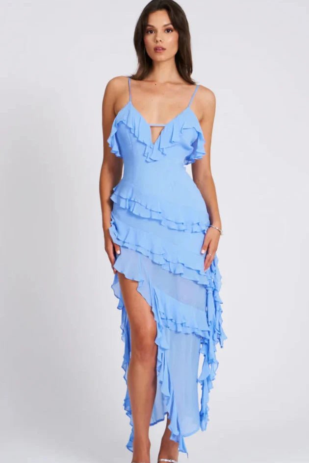 Front view of a light blue ruffled midi dress with thin straps and layered skirt