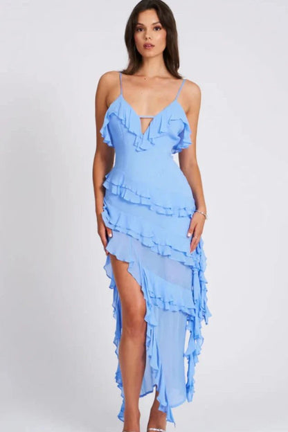 Front view of a light blue ruffled midi dress with thin straps and layered skirt