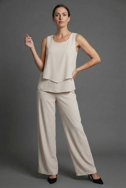 Beige sleeveless top with matching wide leg pants in a neutral summer co ord set