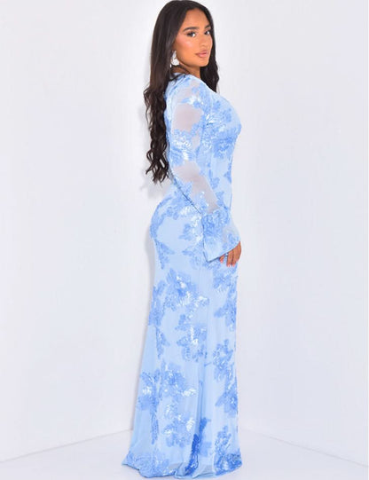 Side view of light blue floral maxi dress with sheer long sleeves and flared cuffs