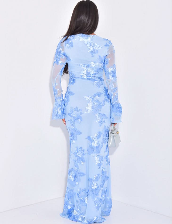 Back view of light blue floral long sleeve maxi dress with sheer sleeves and fitted shape