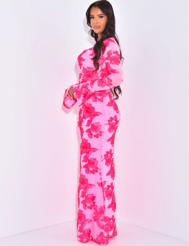 Side view of pink floral long sleeve maxi dress with sheer sleeves and bodycon fit