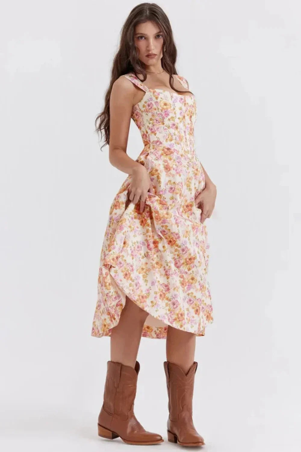 Floral midi dress with asymmetrical hem and front slit, shown full length for wedding guest outfit