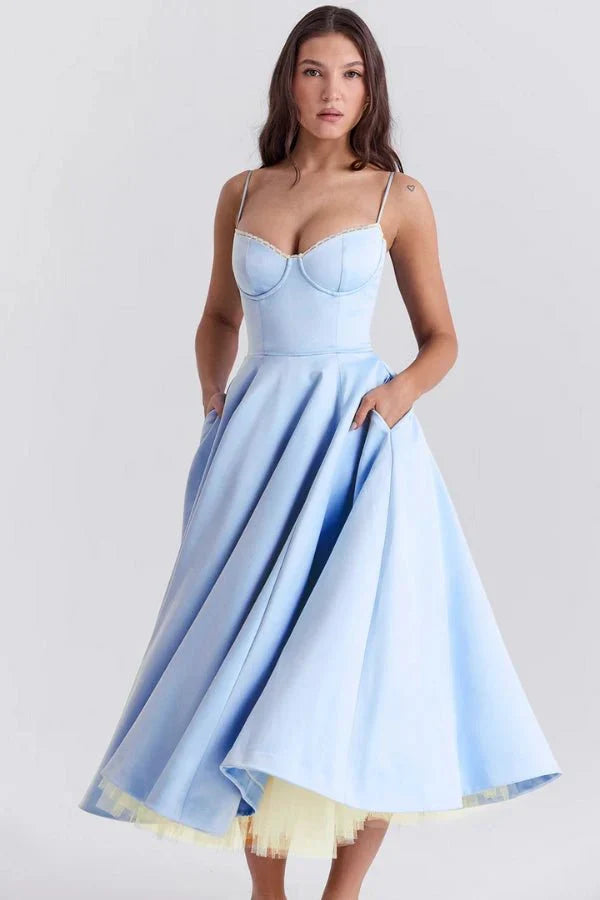 Light blue midi dress with pockets and full skirt for wedding guest