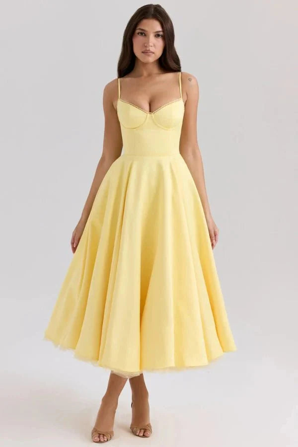 Front view of pale yellow midi dress with corset-style bodice and flared wedding guest skirt