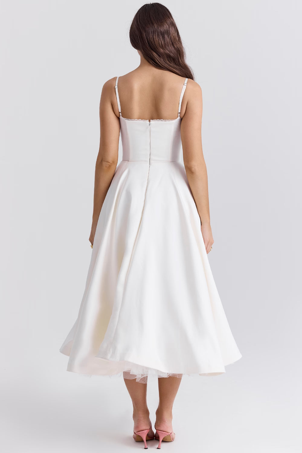 Back view of white midi dress with fitted bodice and full skirt