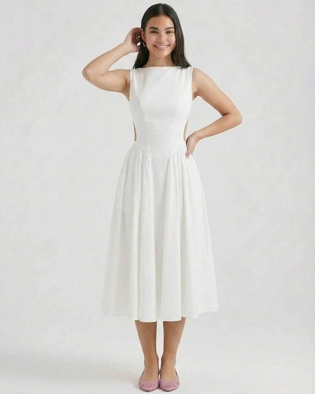 Front view of white midi dress with side cutouts, boat neck, and flared skirt